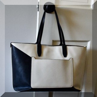 H25. Black and buff leather tote.